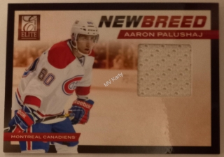 2011-12 Panini Elite - New Breed Materials #21 - Aaron Palushaj
